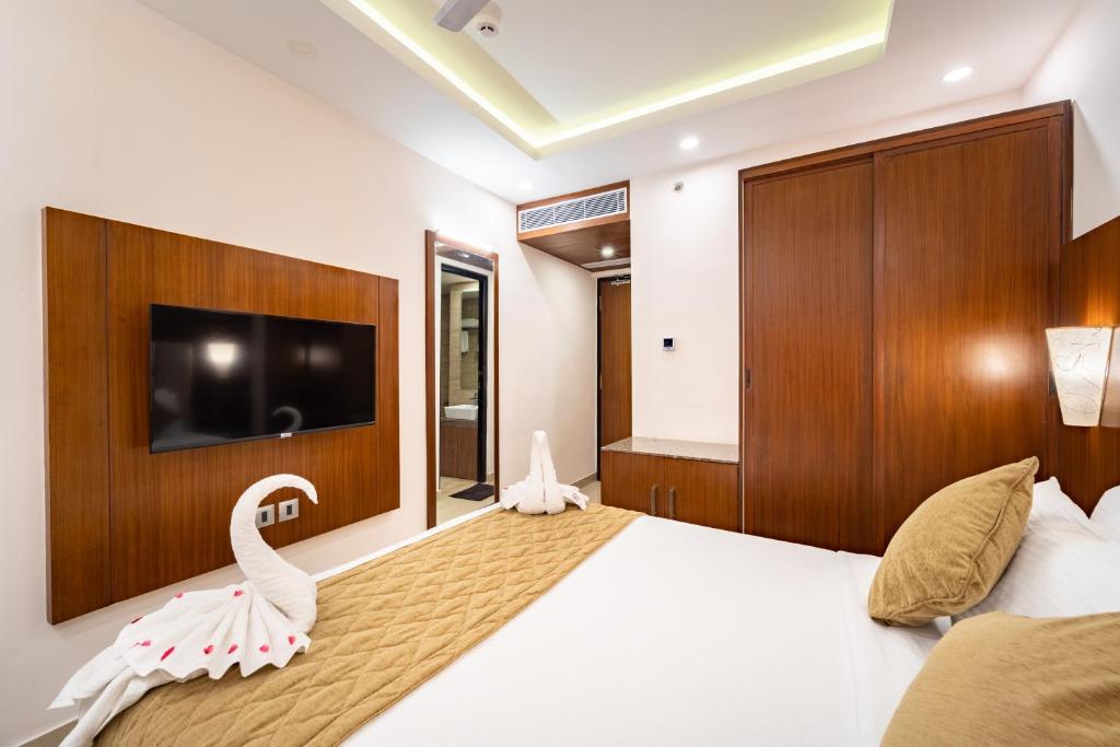 Postel nebo postele na pokoji v ubytování La Grrande Malar - The Boutique Hotel Pondicherry
