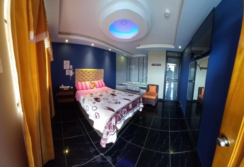 Postel nebo postele na pokoji v ubytování Hostal Aventura