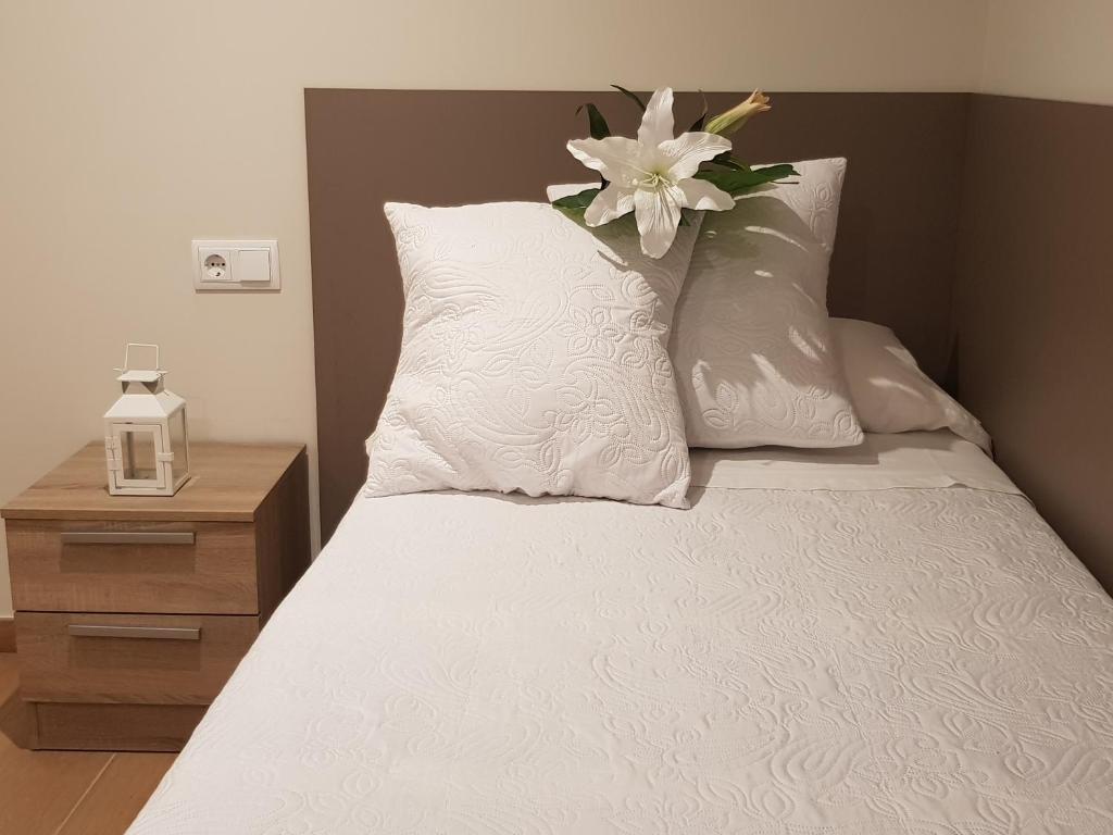 Postel nebo postele na pokoji v ubytování Cardona Fira