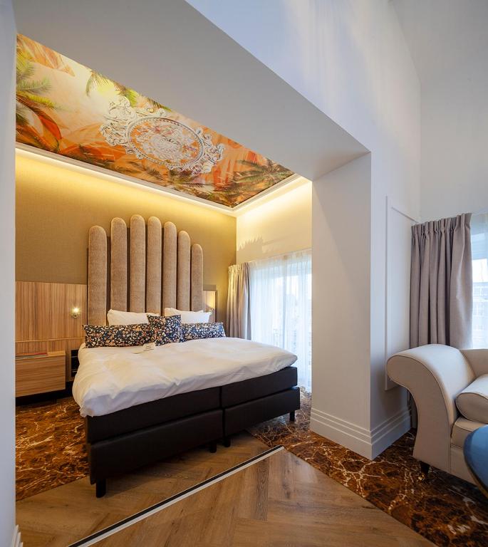 Postel nebo postele na pokoji v ubytování Boutique Hotel Jersey