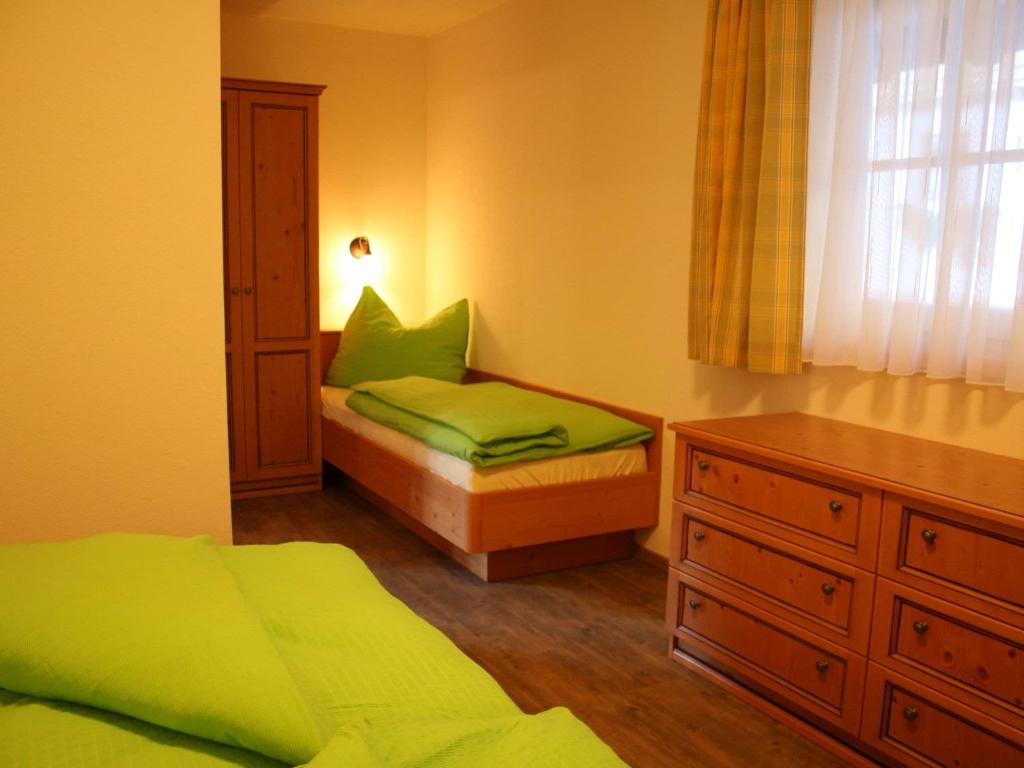 Postel nebo postele na pokoji v ubytování Holiday home in Leogang with sauna in ski area