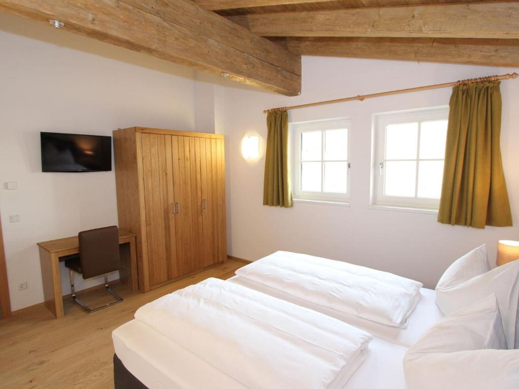 Posteľ alebo postele v izbe v ubytovaní Chalet in ski area in Saalbach-Hinterglemm
