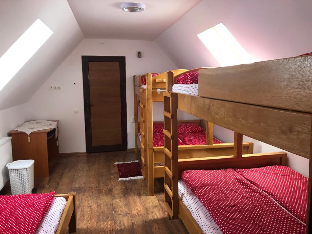 Postel nebo postele na pokoji v ubytování Tünde Vendégház