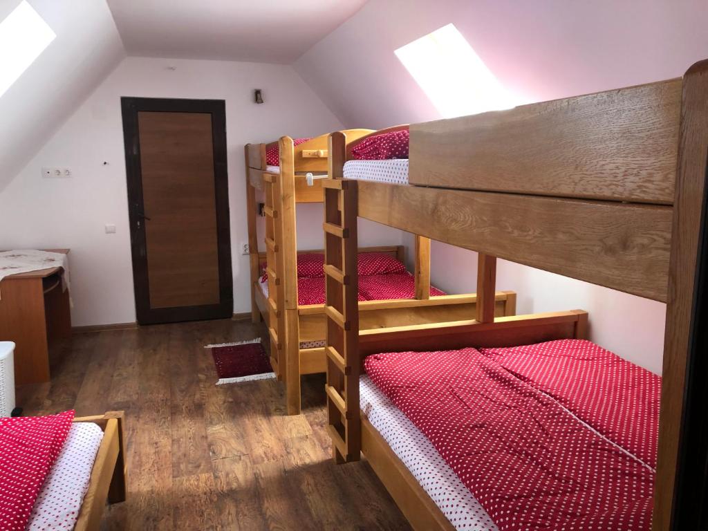 Postel nebo postele na pokoji v ubytování Tünde Vendégház