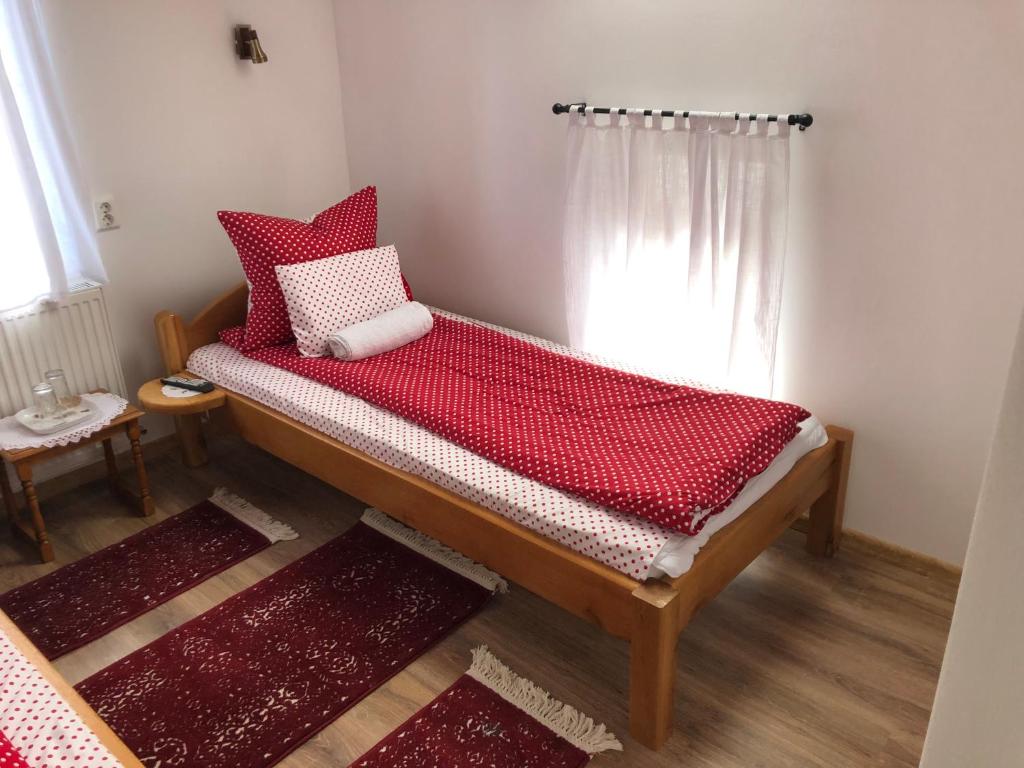 Postel nebo postele na pokoji v ubytování Tünde Vendégház