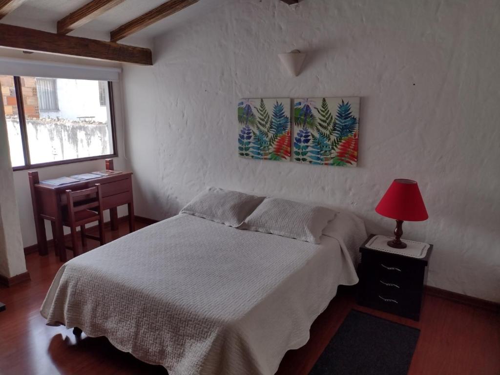 Postel nebo postele na pokoji v ubytování Casa Turística Camitas Inn
