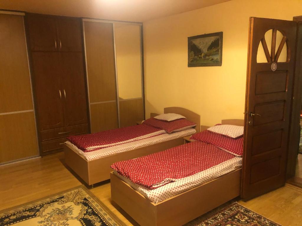 Postel nebo postele na pokoji v ubytování Tünde Vendégház