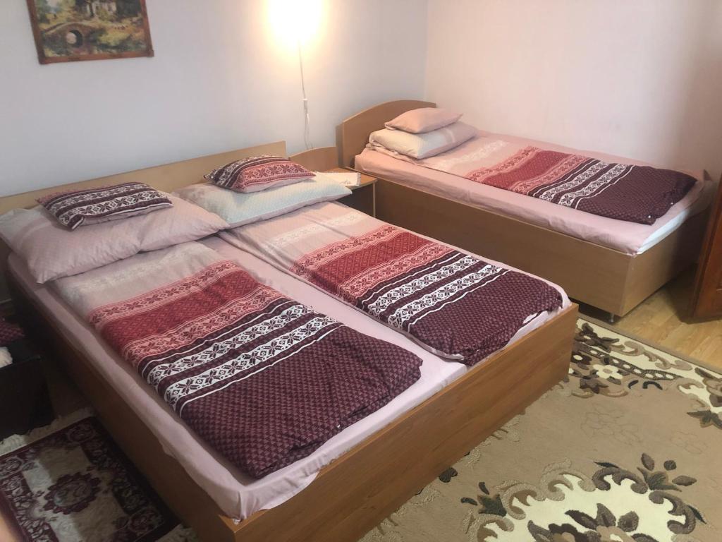 Postel nebo postele na pokoji v ubytování Tünde Vendégház
