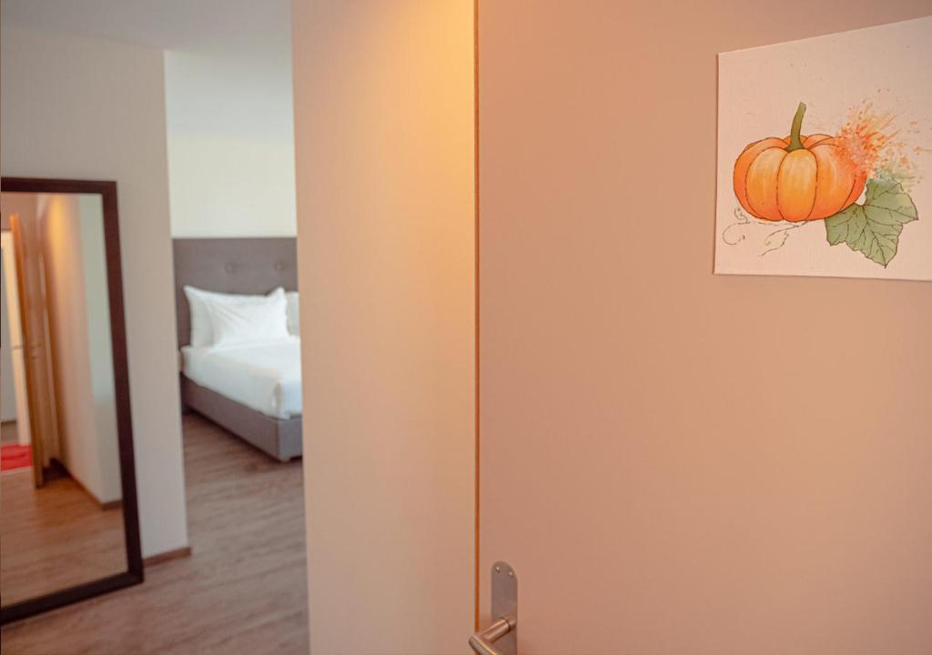 Postel nebo postele na pokoji v ubytování Auberge Le Relais