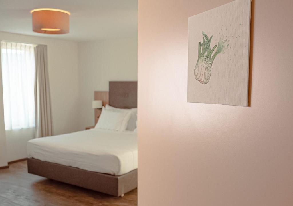 Postel nebo postele na pokoji v ubytování Auberge Le Relais