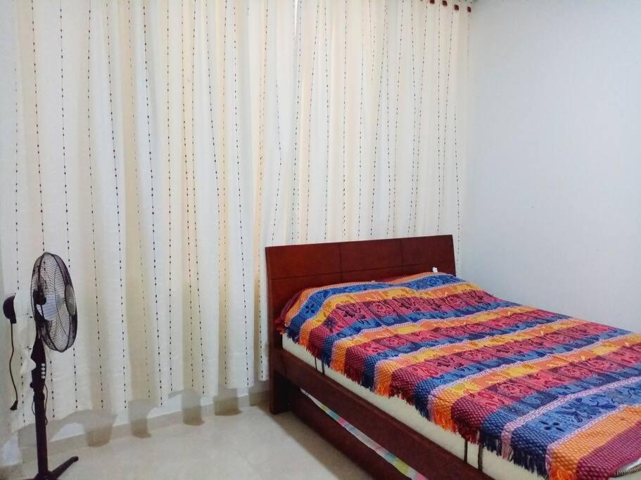 Postel nebo postele na pokoji v ubytování Casa vacacional Girardot 5 habit