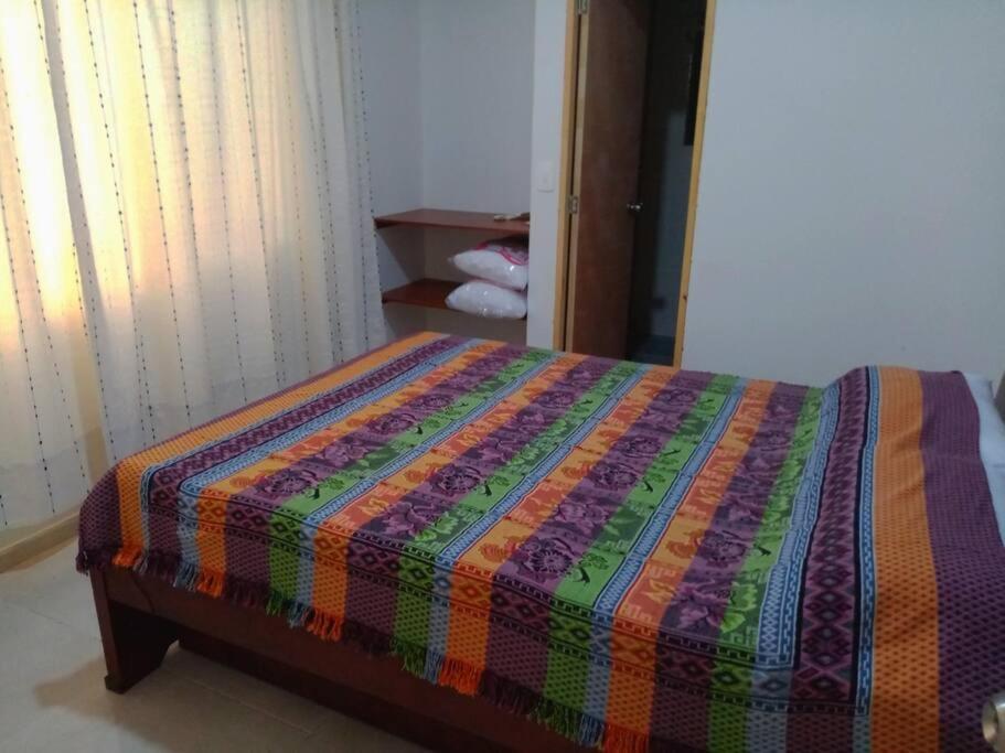 Postel nebo postele na pokoji v ubytování Casa vacacional Girardot 5 habit