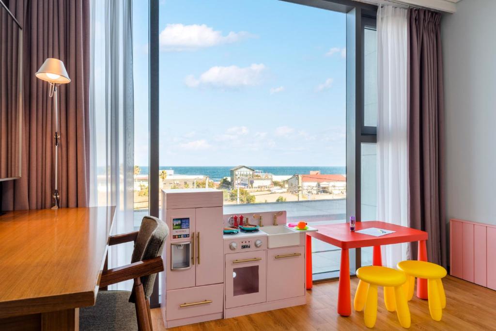Kuchyň nebo kuchyňský kout v ubytování Grabel Hotel Jeju