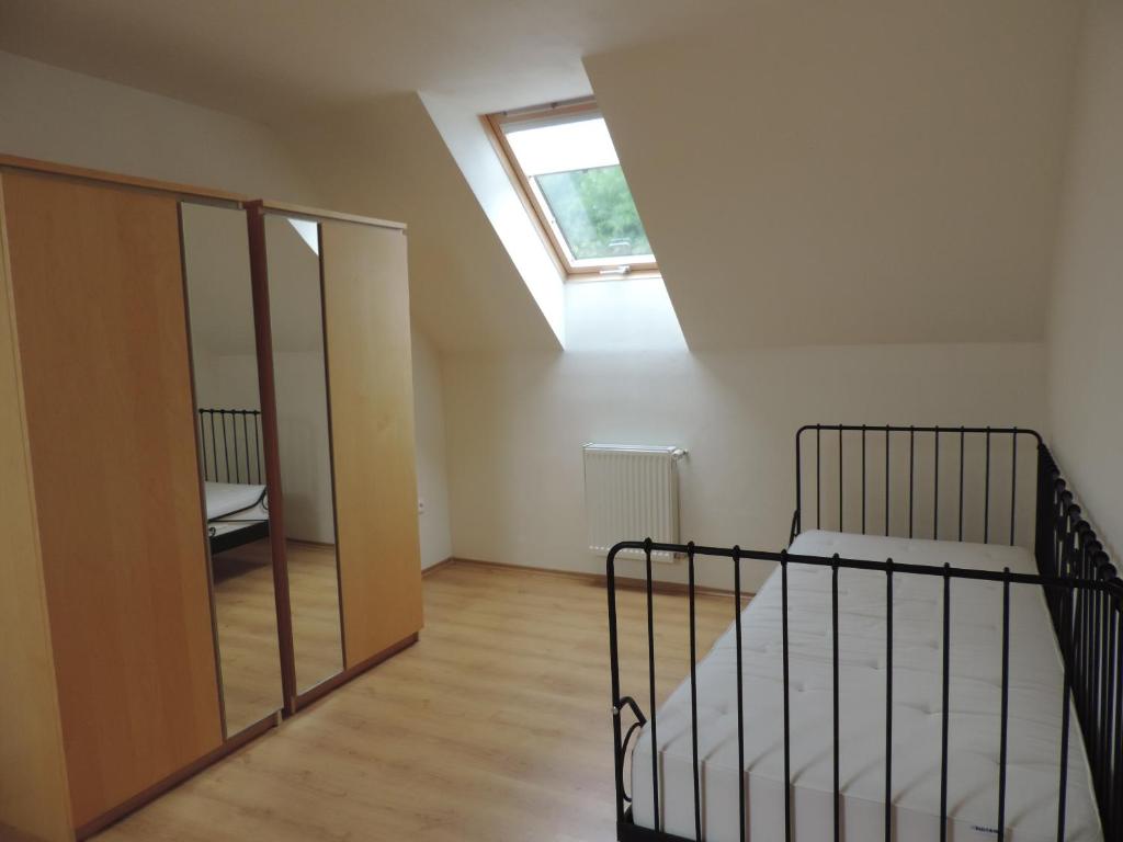 Postel nebo postele na pokoji v ubytování Apartmánový Dom River