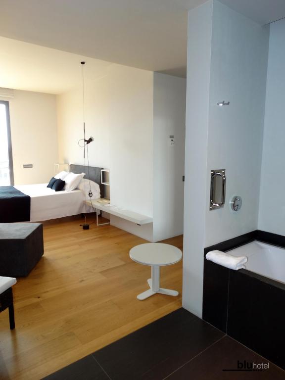 Postel nebo postele na pokoji v ubytování Blu Hotel Almansa