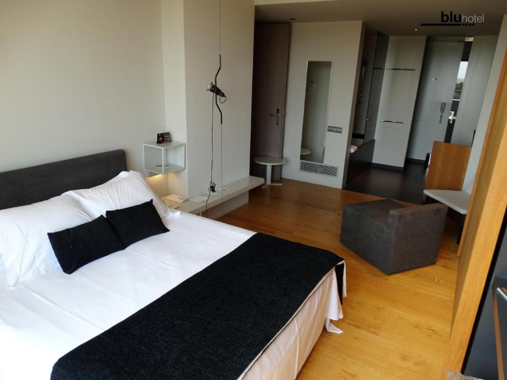 Postel nebo postele na pokoji v ubytování Blu Hotel Almansa
