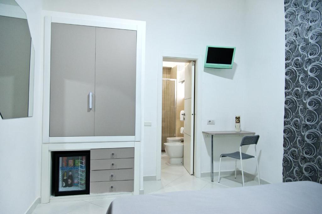 Telewizja i/lub zestaw kina domowego w obiekcie Hotel Regina