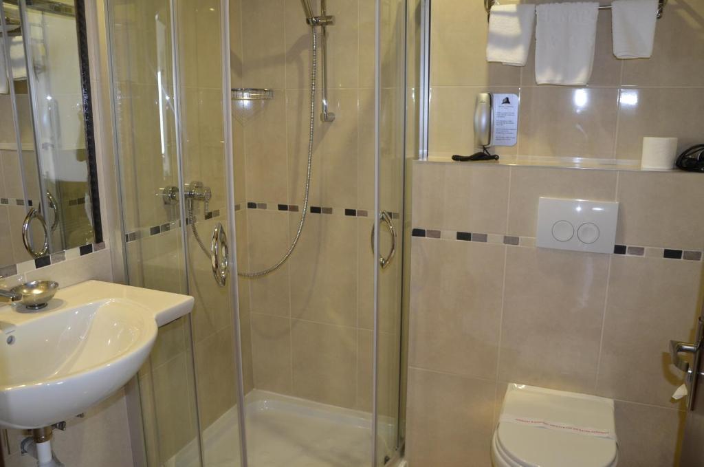 Koupelna v ubytování Grand Hotel Napoca