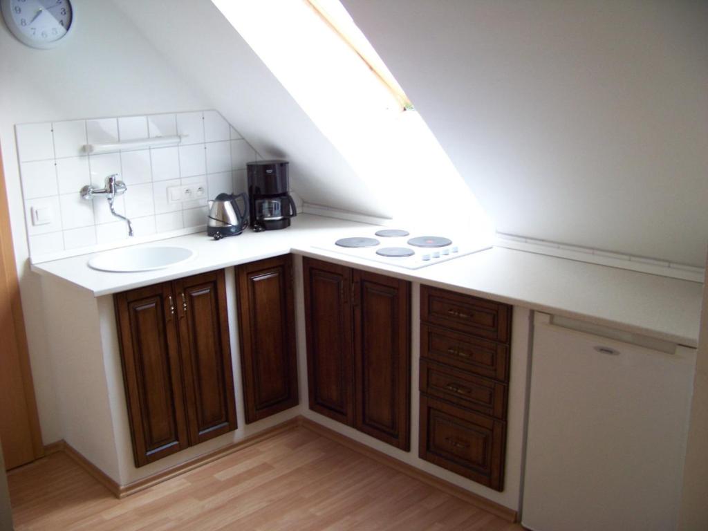 a bathroom with a sink and a counter with a sink at Tisá 488 in Tisá