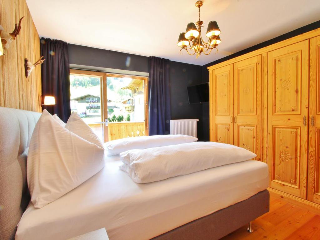 Posteľ alebo postele v izbe v ubytovaní Chalet in Ellmau near Ski Lift
