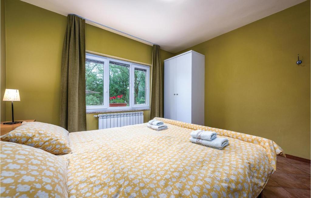 Postel nebo postele na pokoji v ubytování Stunning Apartment In Umag With Wifi