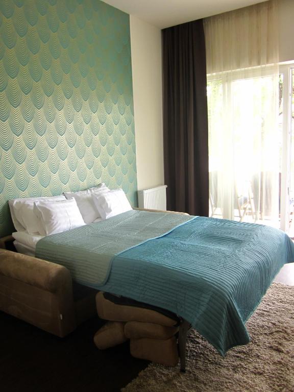 Postel nebo postele na pokoji v ubytování Hotel Ankavi