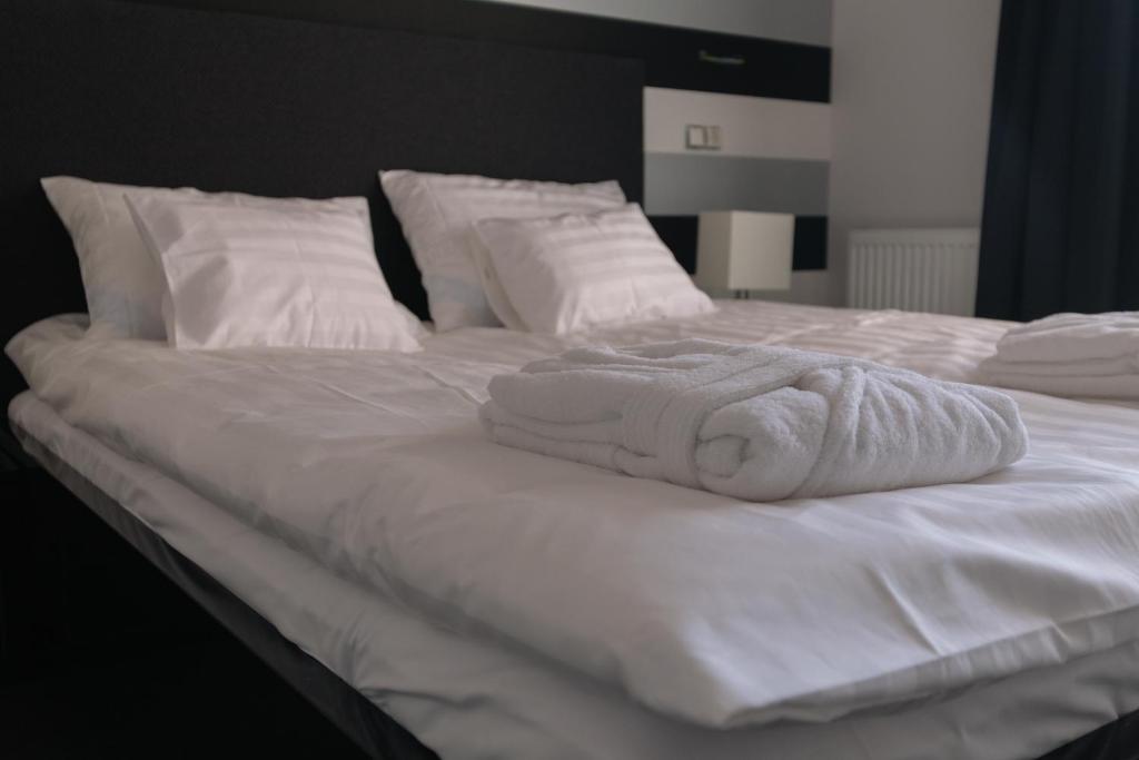 Postel nebo postele na pokoji v ubytování Hotel Ankavi