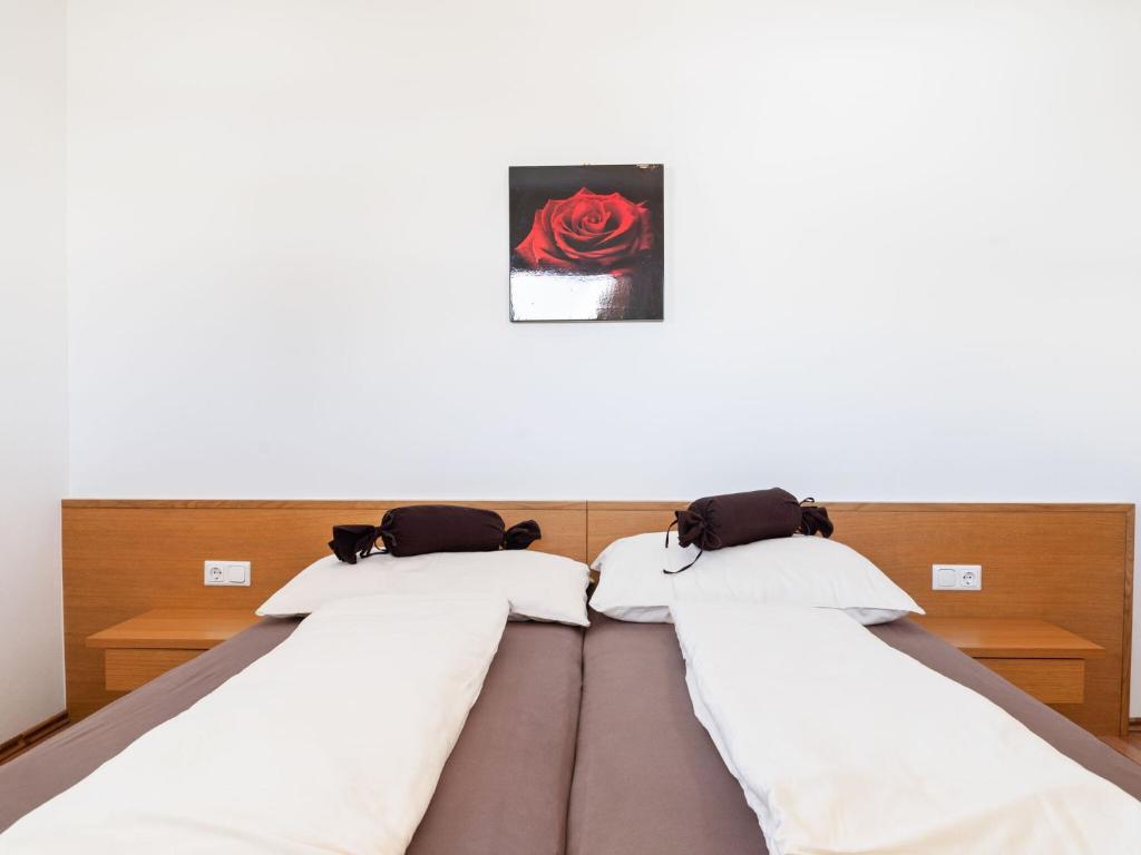 Łóżko lub łóżka w pokoju w obiekcie Apartment in Saalfelden near Ski Slopes