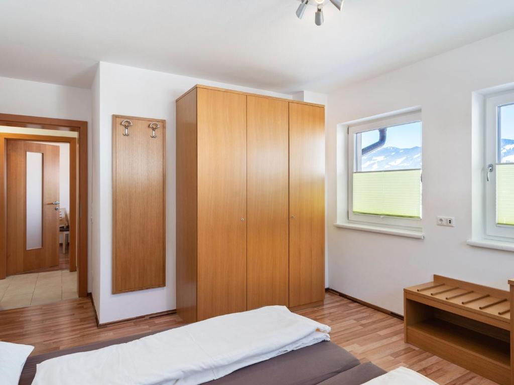 Łóżko lub łóżka w pokoju w obiekcie Apartment in Saalfelden near Ski Slopes