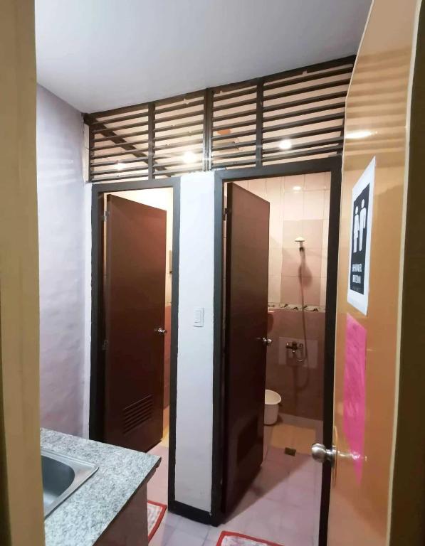 Koupelna v ubytování Amax Inn Makati