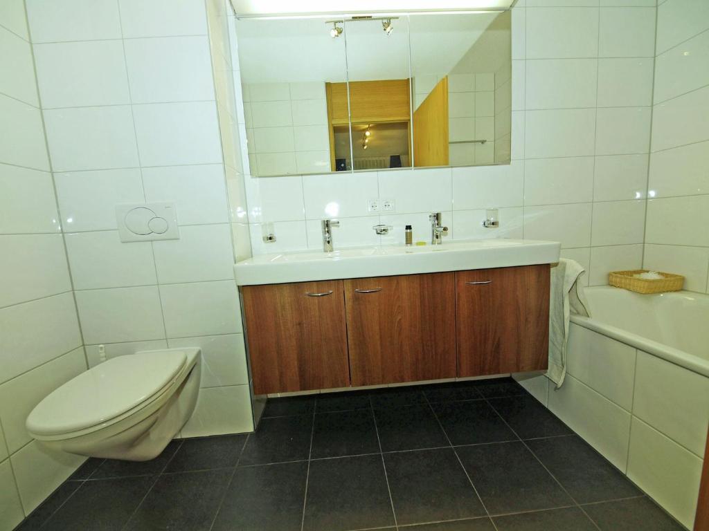 A bathroom at Apartment at the ski lift in Brand in Vorarlberg