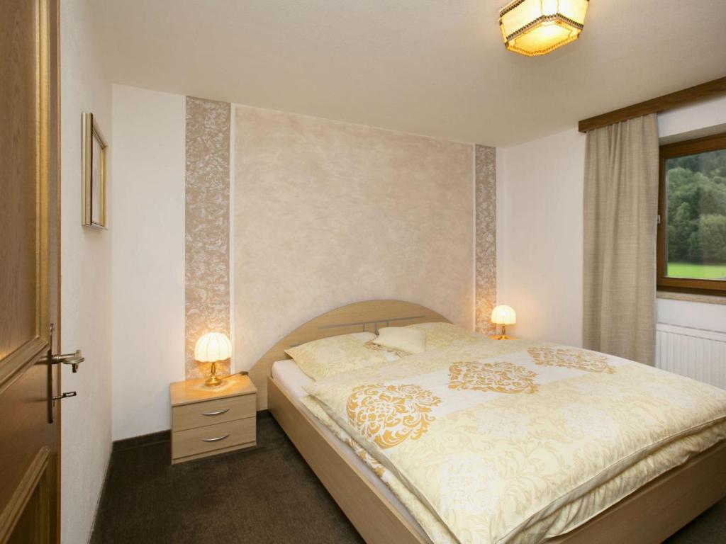 Posteľ alebo postele v izbe v ubytovaní Apartment in Wängle Tyrol with Walking Trails Near