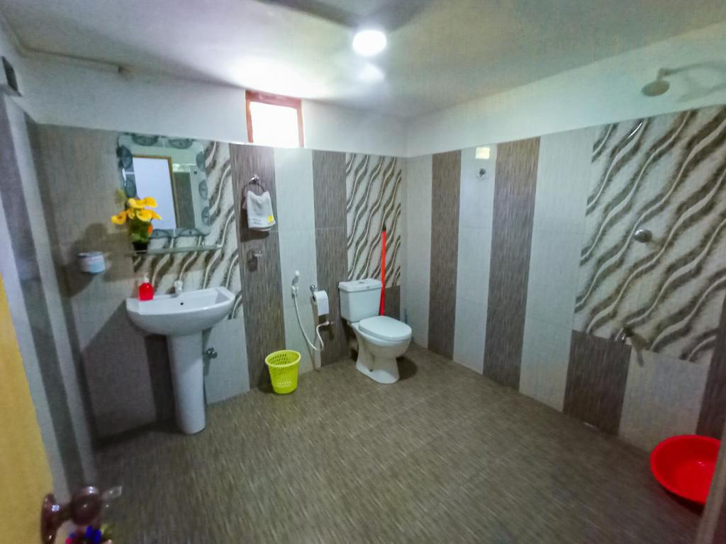 Koupelna v ubytování Sigiri Tarushan Home Stay