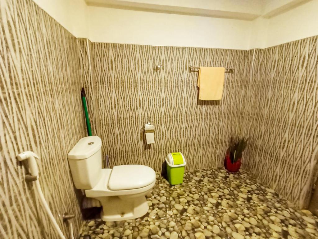 Koupelna v ubytování Sigiri Tarushan Home Stay