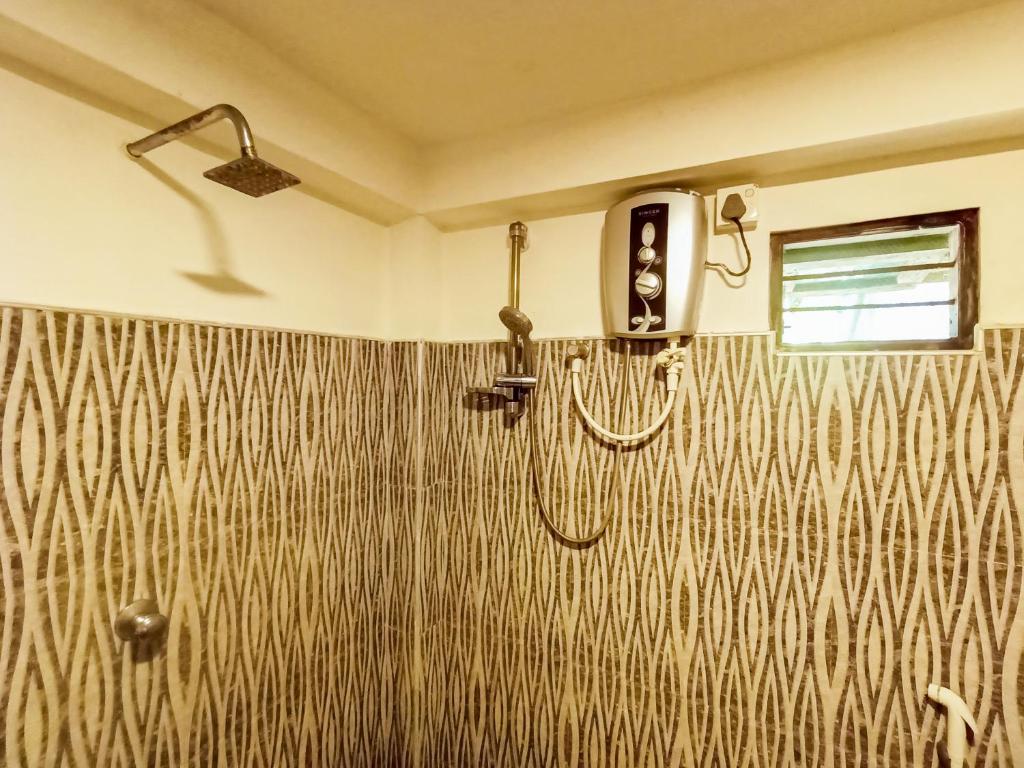 Koupelna v ubytování Sigiri Tarushan Home Stay