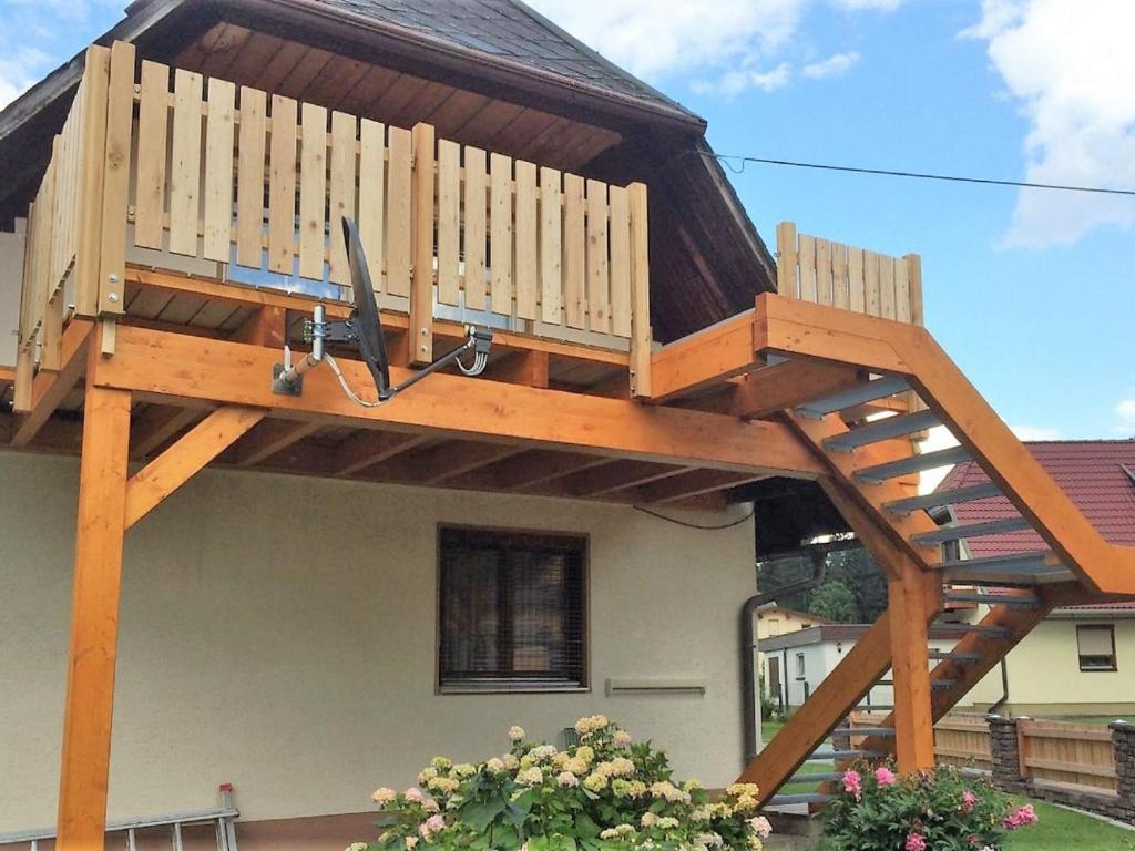 a deck on the side of a house at Holiday apartment in Tr polach near Pressegger See in Tröpolach