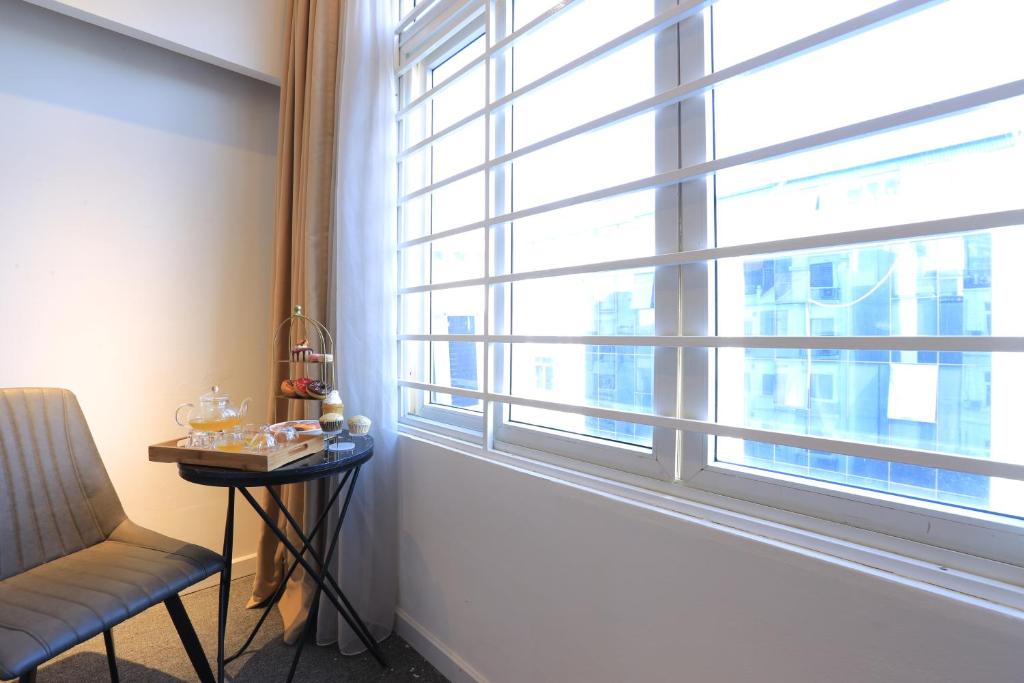 Posezení v ubytování Keypad Hotel - 28 Dịch Vọng Hậu