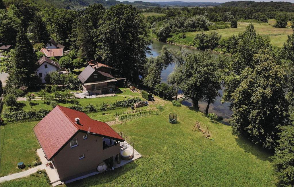 an aerial view of a house and a river at Beautiful Home In Pokupska Slatina With Jacuzzi in Pokupsko