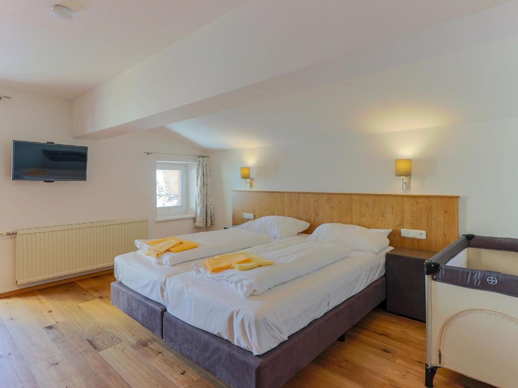 Posteľ alebo postele v izbe v ubytovaní Holiday home in Krimml with sauna