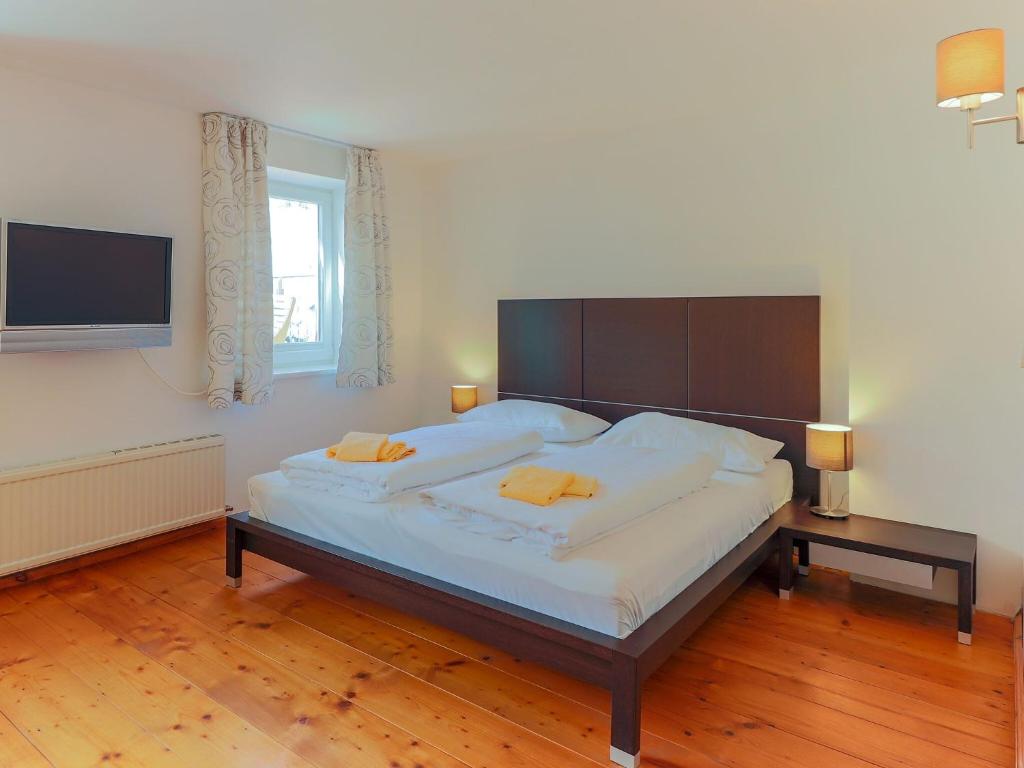 Posteľ alebo postele v izbe v ubytovaní Holiday home in Krimml with sauna