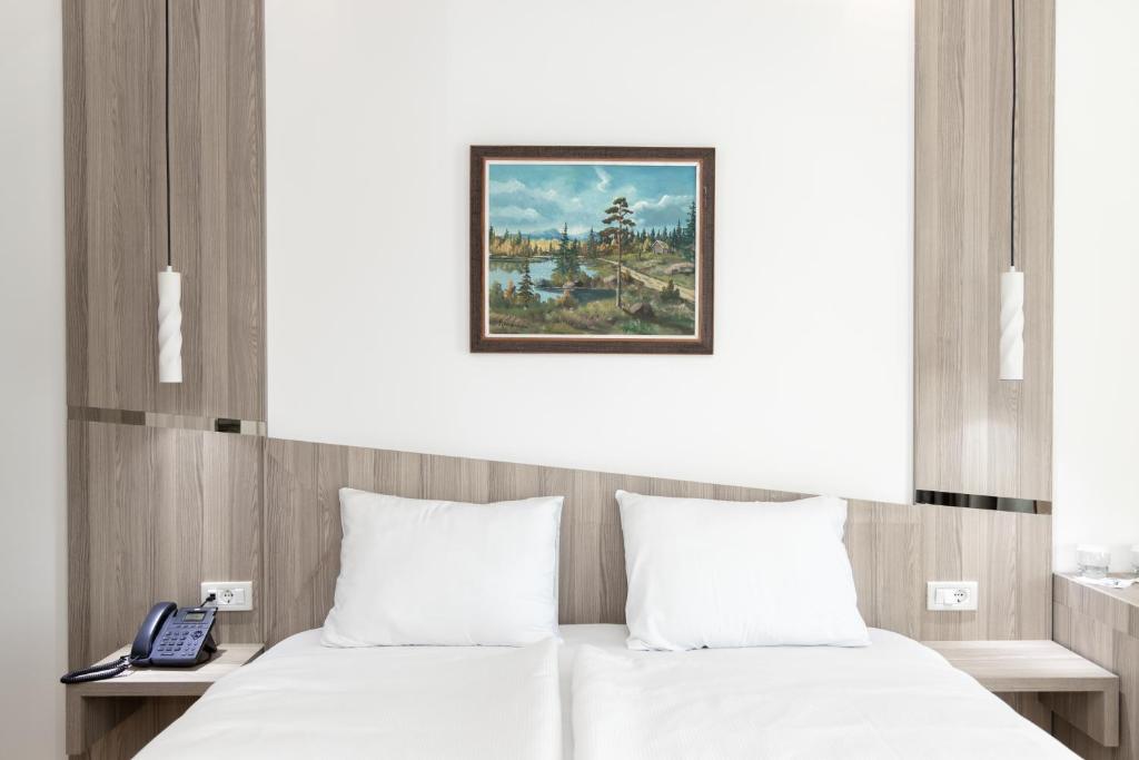 Postel nebo postele na pokoji v ubytování Star Hill Hotel & Spa