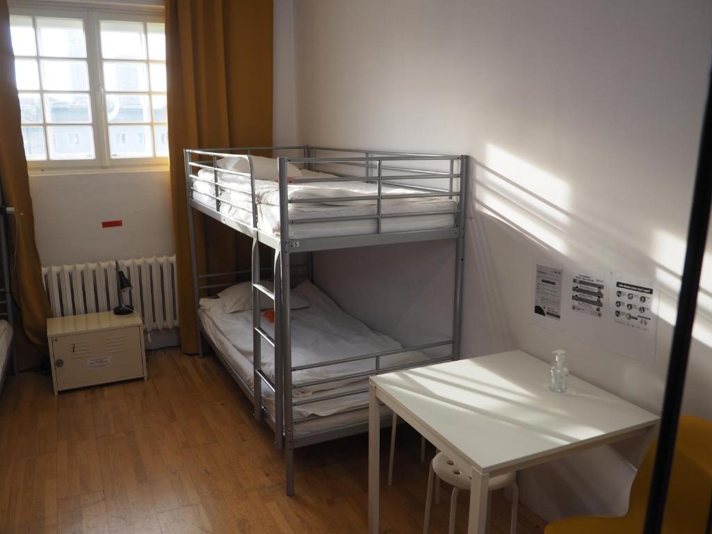 Posteľ alebo postele v izbe v ubytovaní New World St Hostel and Private Room