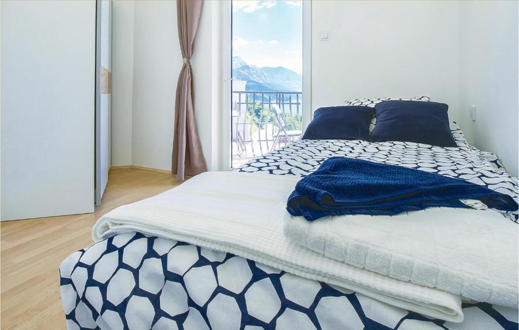 Posteľ alebo postele v izbe v ubytovaní Four-Bedroom Holiday Home In Pisak