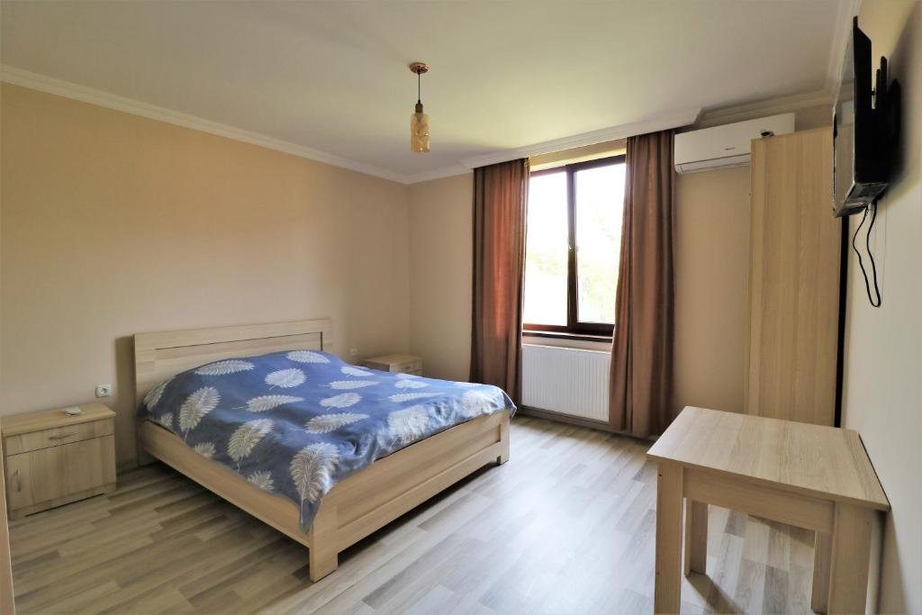 Postel nebo postele na pokoji v ubytování Villa Gio