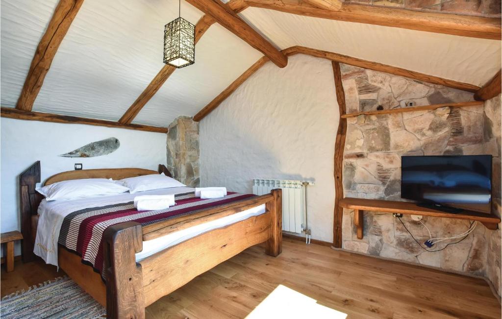 Posteľ alebo postele v izbe v ubytovaní Holiday Home Zastrazisce With Fireplace 03