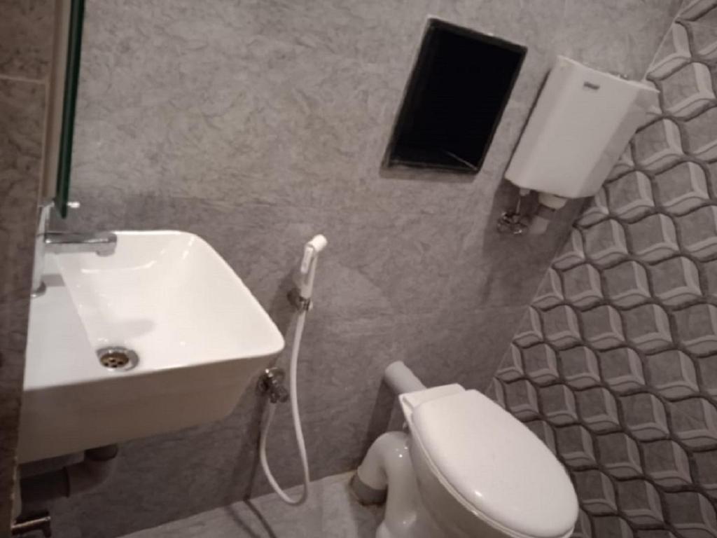 Koupelna v ubytování Nestlay Rooms Ambattur