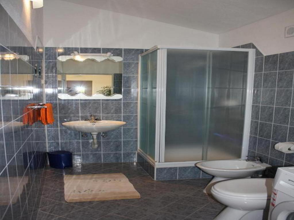 Koupelna v ubytování Apartments Račić