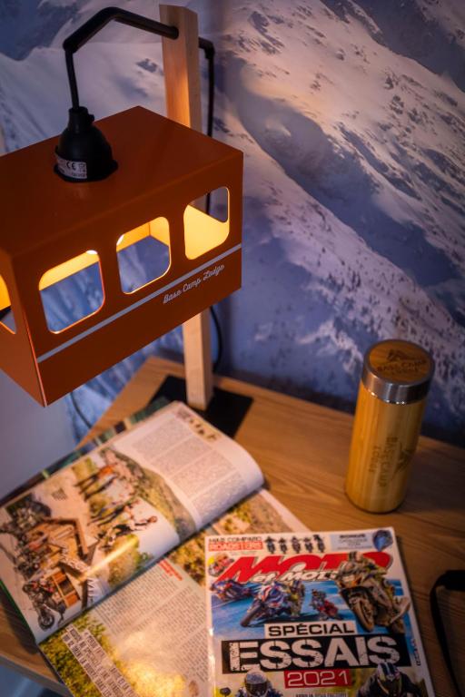 Postel nebo postele na pokoji v ubytování Hotel Base Camp Lodge - Les 2 Alpes