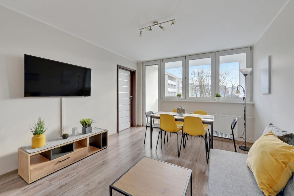 Televízia a/alebo spoločenská miestnosť v ubytovaní Comfort Apartments Gdynia Centrum