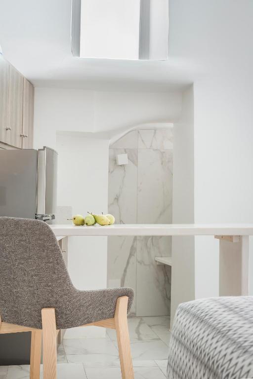 Kuchyň nebo kuchyňský kout v ubytování Kostantis Town Suites